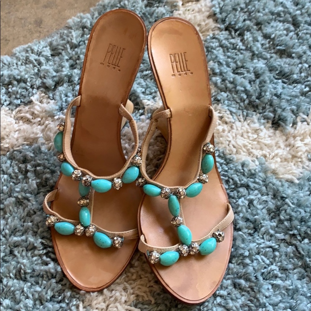Worn several times. Rhinestone and turquoise.
